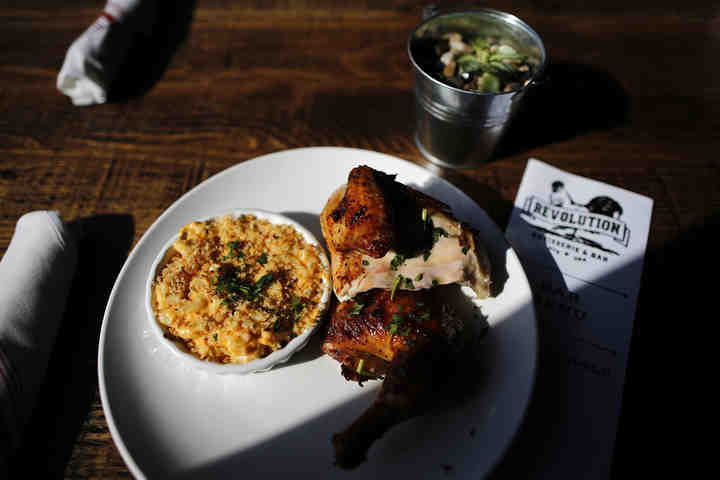 An order of rotisserie chicken at Revolution Rotisserie & Bar in the Pleasant Ridge neighborhood of Cincinnati.    (Sam Greene/The Enquirer / The Cincinnati Enquirer)